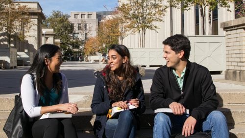 Students studying outside McDonough Hall