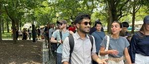 Students walking outside during an LL.M. Orientation tour around Washington DC