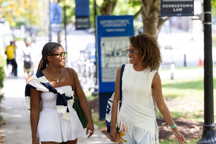 Two students walking on Georgetown Law's Capitol Campus