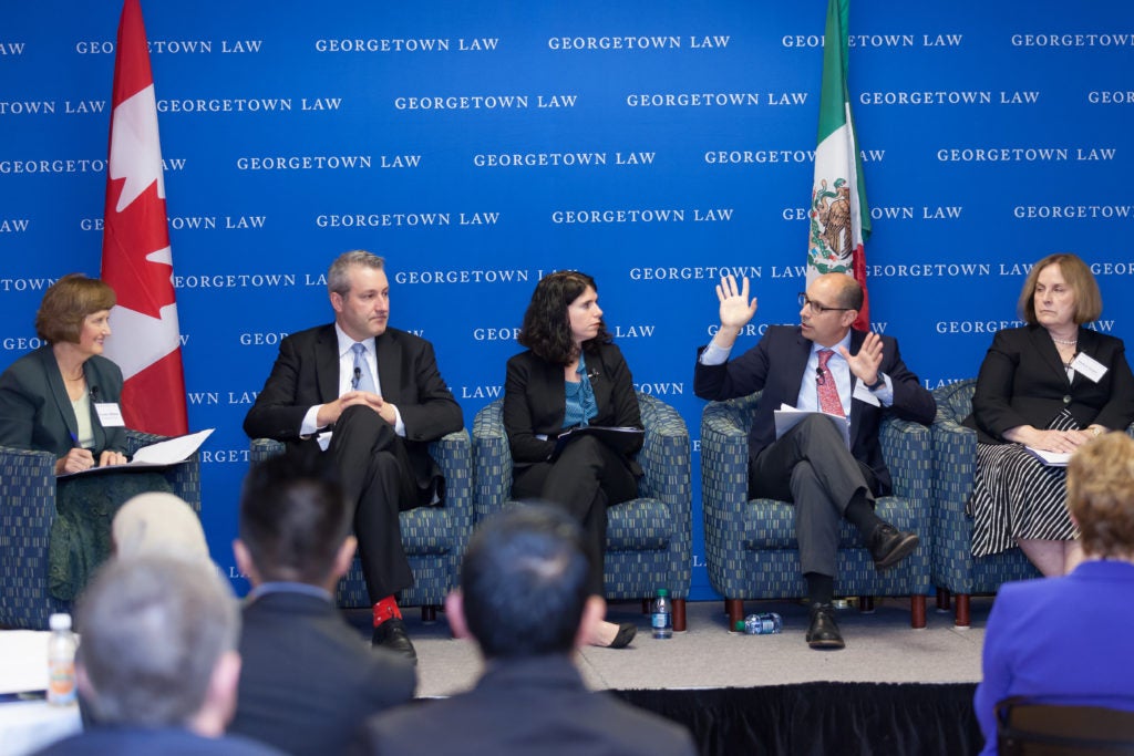 Professor Hillman, Chad Bown, Melinda St. Louis, Antonio Ortiz Mena, and Debra Steger on stage