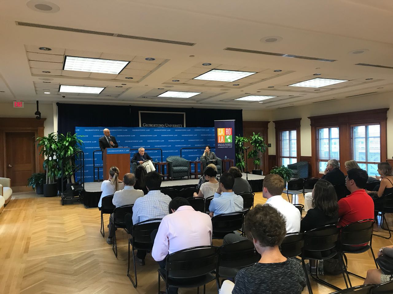 Panelists and students sitting in a discussion on Transparency and International Investment in Argentina