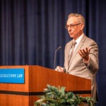 randy barnett speaking at podium