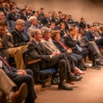 wide shot of audience watching