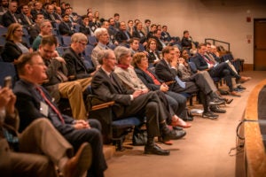 wide shot of audience watching