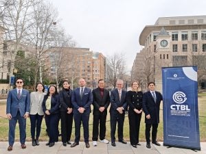 Group photo of the 2025–2026 CTBL Fellows and director Professor Don De Amicis outdoors on the Georgetown Law campus.