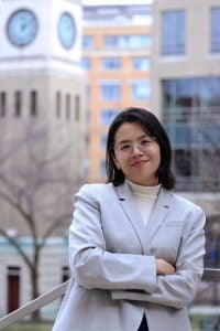 Headshot of Huili Chen on the Georgetown Law campus.