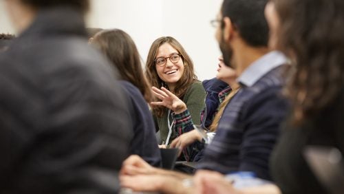 A CTLS student smiling in the clasroom