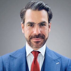 Headshot for Denny Center Fellow Aurelien Portuese