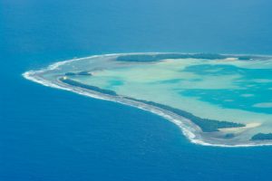 The effects of climate change, including sea level rise and intense heat, threaten to make places like the island nation of Tuvalu uninhabitable within the next several decades.