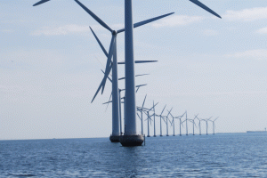 Line of offshore wind turbines. Photo by Pål Espen Bondestad, licensed under https://creativecommons.org/licenses/by/2.0/