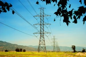 High-voltage transmission lines carry electricity across the landscape.