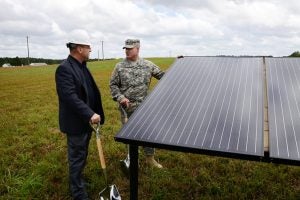 U.S. soldier with a solar panel