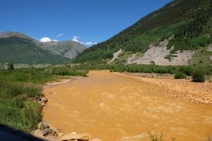 The polluted Animas River. (Photo: Mor: https://www.flickr.com/photos/mmoorr/20912050545)