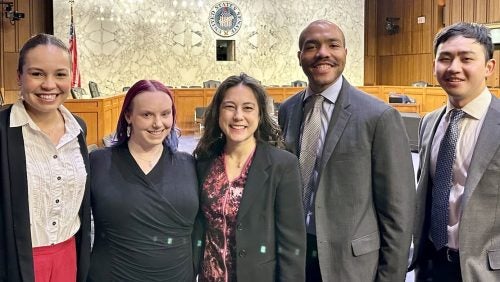 group photo in senate hearing room 