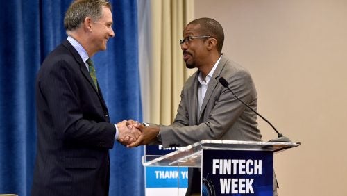 Congressman French Hill Shakes Hands With Chris Brummer at the 2019 Fintech Week 