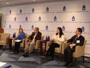 Panelists speaking to event attendees at China Shock Panel