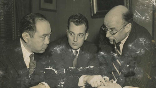 Black and white photo of George Yamaoka, John Brannon, and a third man