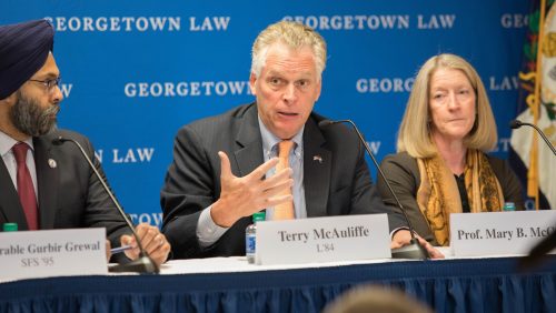 Former Virginia Governor Terry McAuliffe speaks on the SALPAL Launch Event panel. To the left sits New Jersey Attorney General Gurbir Grewal. To the right sits Georgetown Law Professor Mary B. McCord.
