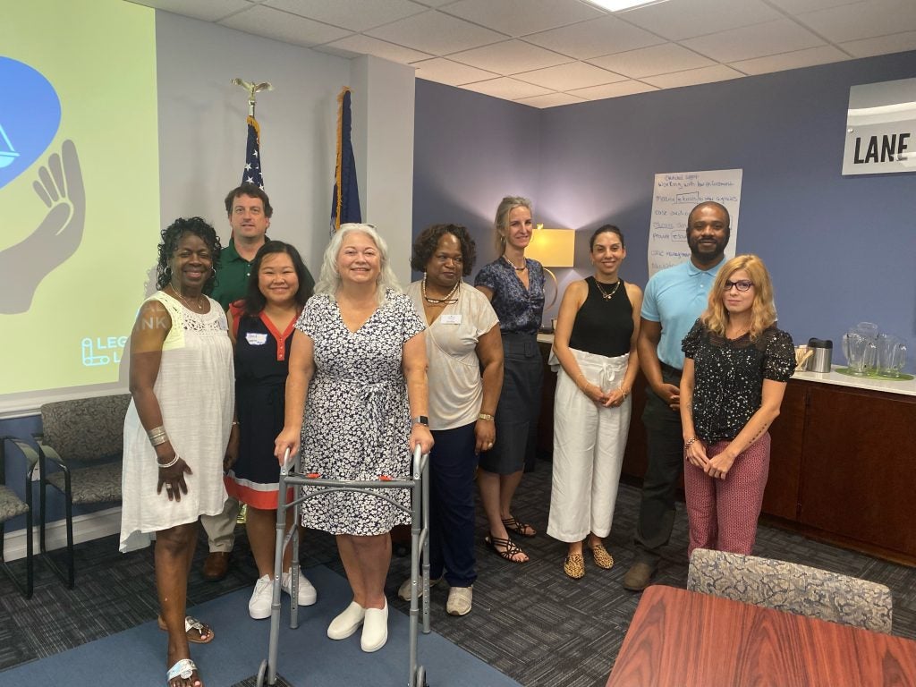 Deb Mihal, Director of the South Carolina Justice Navigators Network, poses with newly trained Justice Navigators