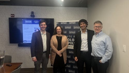 Faiz Thakur and Tech Law Institute Staff smile for a picture