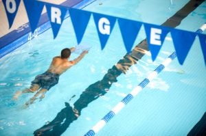 student swimming laps in the Georgetown Law pool