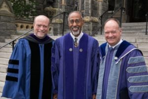 Georgetown Law Dean William M. Treanor with Honorary Degree Recipient Charles R. Lawrence III and Georgetown University President John J. DeGioia. Lawrence, the 2017 Law Commencement speaker, is a pioneer in critical race theory.