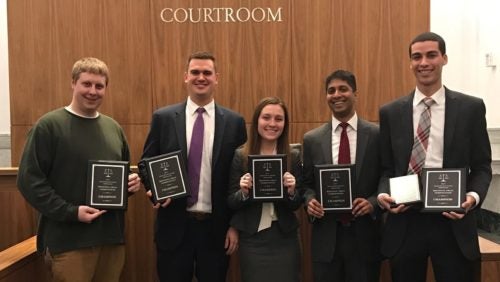 Students getting Trial Advocacy award