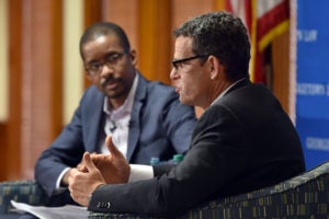 Georgetown Law Professor Chris Brummer, faculty director of the Institute of International Economic Law, with former CIA Deputy Director David Cohen.