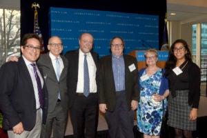 Celebrating the 10th Anniversary of the O’Neill Institute: Executive Director Oscar Cabrera, University Professor and Faculty Director Larry Gostin, Dean William M. Treanor, Eric Rosenthal (L’92), Professor Angela Campbell and Priscila Rodriguez.