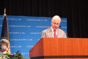 Professor from Practice Andrew I. Schoenholtz speaks at a podium at the 14th Annual Immigration Law and Policy Conference at Georgetown Law on September 25 (photo courtesy Migration Policy Institute)