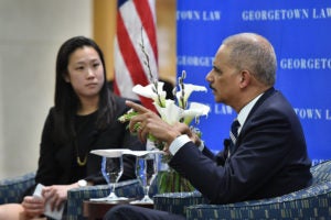 Outgoing Georgetown Law Journal Editor-in-Chief Jennifer Ong (L’18) interviews former Attorney General Eric Holder at the GLJ’s Sixth Annual Banquet on March 23.