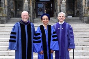 Georgetown Law Dean William M. Treanor with honorary degree recipients, D.C. Delegate Eleanor Holmes Norton and Judge Merrick Garland, at Commencement 2018 on May 20.