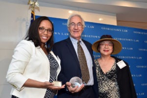 Visiting Professor Charisma Howell and retiring Professor Richard Roe of Georgetown Law's Street Law clinic with May O'Brien, wife of the late Ed O'Brien (L'73)(founder of the national Street Law program), at Georgetown Law on June 28.