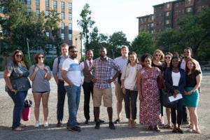 Professor Anthony Cook takes his Summer 2018 Community Development Seminar students to a potential home for his GateBridge project.