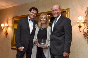 Bruce (L’80) and Ann Blume (Parents ’08, ’20), shown here with Georgetown Law Dean William M. Treanor, have given $10 million to establish the Blume Public Leadership Institute. 