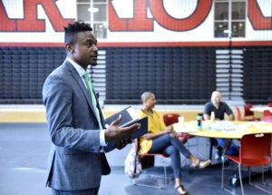 Participants at a September 8 breakfast meeting discuss climate change.