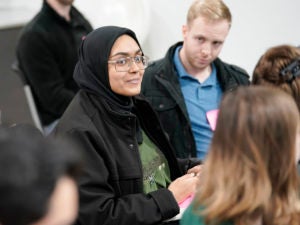 Georgetown Human Rights Institute volunteers participate with others in an orientation meeting on Sunday, Dec. 30, 2018 in Dilley, Texas. (Darren Abate/AP Images for Georgetown Law)