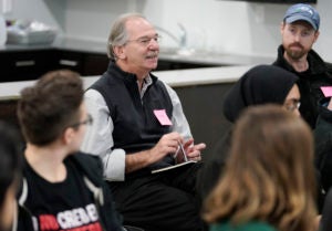 Georgetown Human Rights Institute volunteers participate with others in an orientation meeting on Sunday, Dec. 30, 2018 in Dilley, Texas. (Darren Abate/AP Images for Georgetown Law)