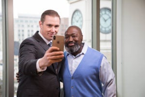 Professor Shon Hopwood and his former client, Matthew Charles, celebrate at Georgetown Law on February 6, the day after Charles was recognized by President Donald Trump at the State of the Union Address.