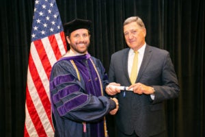 Derrick Anderson (L'19) with Major General Tim Haake (LL.M.'77).