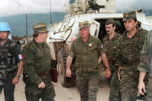 The recent PBS documentary FRONTLINE examines the war crimes trial of one of the most infamous figures from the Balkan wars of the 1990s, Ratko Mladic (pictured). Glenna Macgregor (L’05) and Arthur Traldi (L’06) both served on the prosecution team at The Hague during the trial and appeared in the documentary. Trial began in May 2012 and the verdict was delivered in 2017. (Mladic photo by Gabriel Bouys/AFP/Getty Images, courtesy of FRONTLINE.)