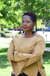 Nancy Akosah standing outdoors and smiling at the camera