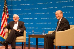 Retired Justice John Paul Stevens is pictured with Dean William M. Treanor in Georgetown Law’s Hart Auditorium in this October 1, 2014, file photo. Stevens died July 16, 2019.