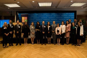 Participants at Latin America workshop in front of stage in Gewirz student center.