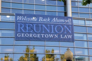 Alumni Welcome Back sign on the outside of the Ginsburg Sport and Fitness Center.