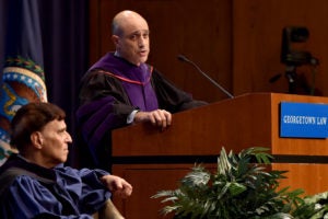 Judge Robert A. Katzmann, seated, and Associate Dean John Mikhail, at podium.