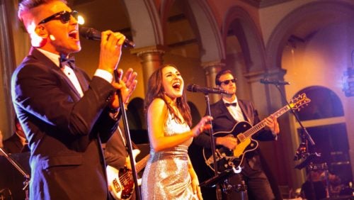Steel Toe Stiletto plays to a large crowd of alumni at the National Building Museum at the 2018 Reunion Gala!