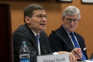 Michael Morell (M.A.'84), former acting director of the CIA, and Georgetown Law Professor Mitt Regan.