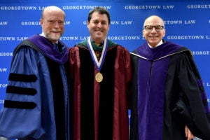 Georgetown Law Dean William M. Treanor, Professor David A. Hyman, and Professor Lawrence O. Gostin at the installation of Hyman (an expert on the regulation and financing of health care) as the Scott K. Ginsburg Professor of Health Law & Policy on November 13.