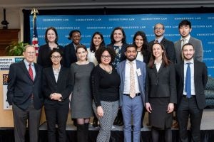 The Center on Poverty and Inequality’s Economic Security and Opportunity Initiative staff with organizers of the Youth Opportunity Guarantee at a Dec. 5 event.